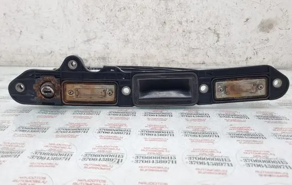 Volkswagen Jetta V Trunk door license plate light bar 1T0827574D 1T0827574