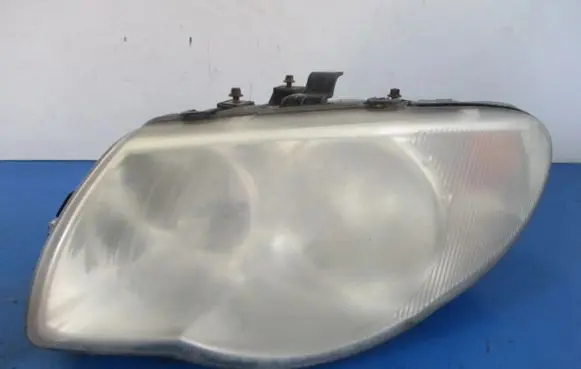 Chrysler Grand Voyager IV Headlight/headlamp 04857831AB