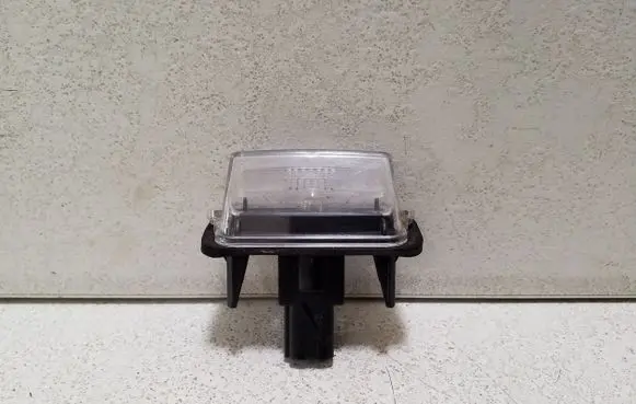 Toyota Corolla E210 E21 Number plate light L000012 FEKA0D76 0D76