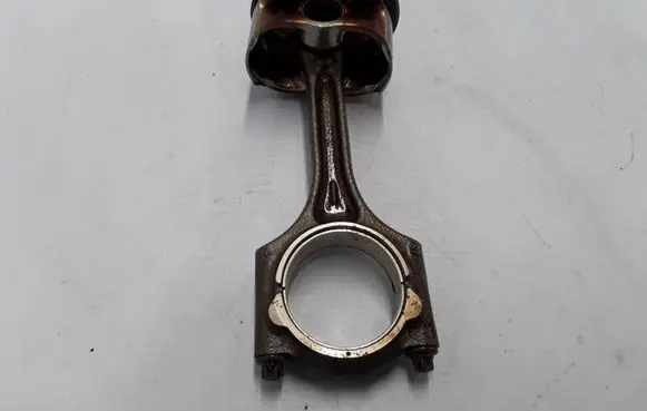 Piston with connecting rod