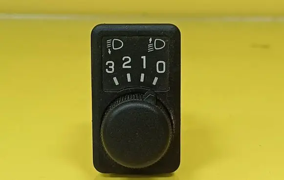 Nissan Primera Headlight level height control switch 36934A