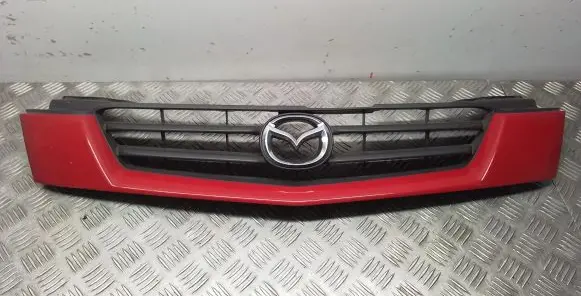 Mazda Demio Front bumper upper radiator grill D26750712