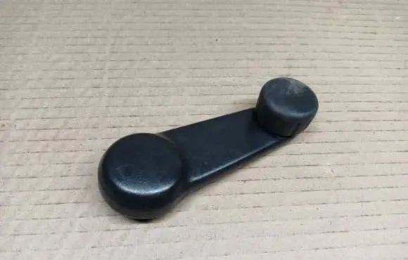Nissan Micra Rear door window winding handle 