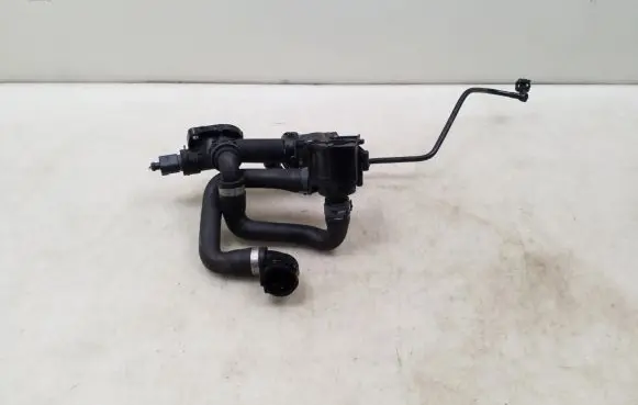 Thermostat/thermostat housing