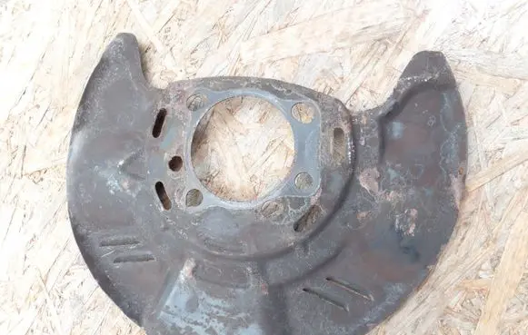 Subaru Legacy Front brake disc dust cover plate 
