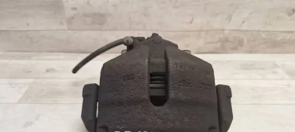 Volkswagen PASSAT B6 Front brake caliper 