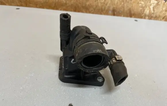 Thermostat/thermostat housing