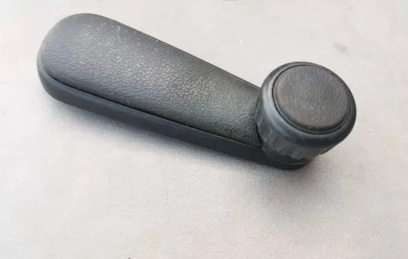 Volkswagen Golf II Rear door window winding handle 191837579