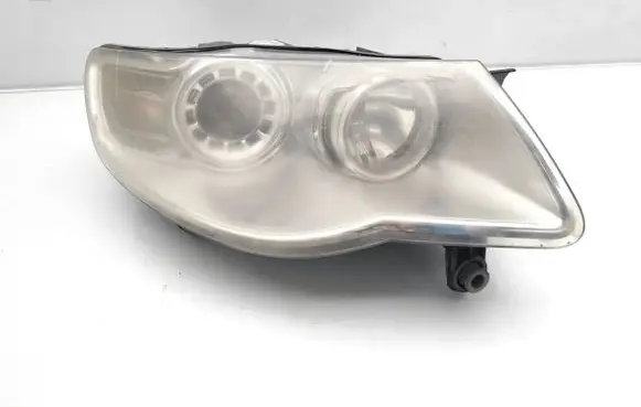 Volkswagen Touareg I Headlight/headlamp 7L6941032A 1LL247032-04