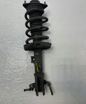 KIA Carens III Front shock absorber with coil spring