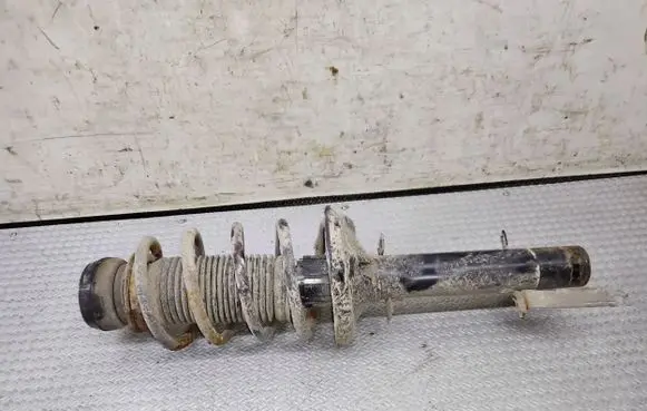 Volkswagen Golf IV Front shock absorber with coil spring