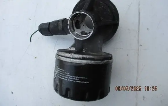 Renault Kangoo II Oil filter mounting bracket 