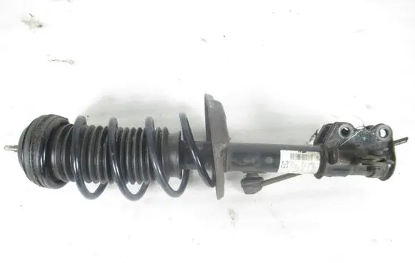 Opel Corsa D Front shock absorber with coil spring 