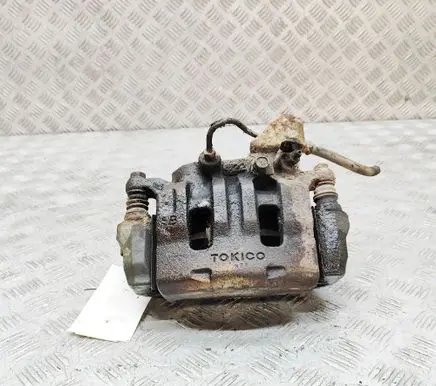 Mitsubishi L200 Front brake caliper MR977363