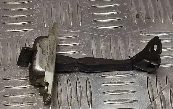 Toyota Yaris Front door check strap stopper
