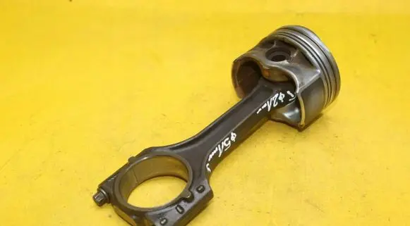 Piston with connecting rod