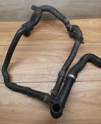 Volkswagen PASSAT B8 Engine coolant pipe/hose 5Q0121619D
