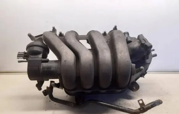 Volkswagen Golf V Intake manifold 06F133210D