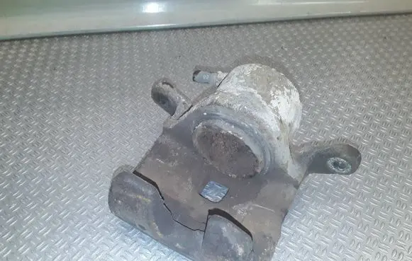 Nissan Tiida C11 Front brake caliper 