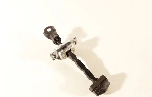 Front door check strap stopper