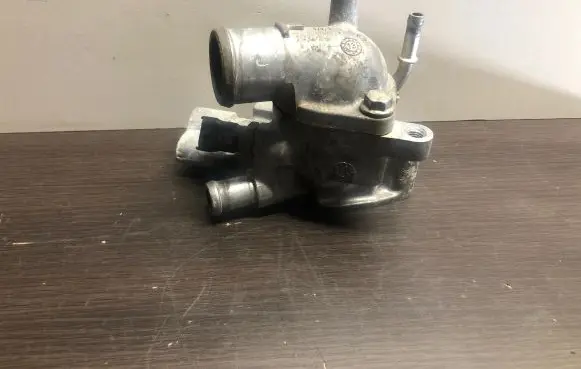 Thermostat/thermostat housing