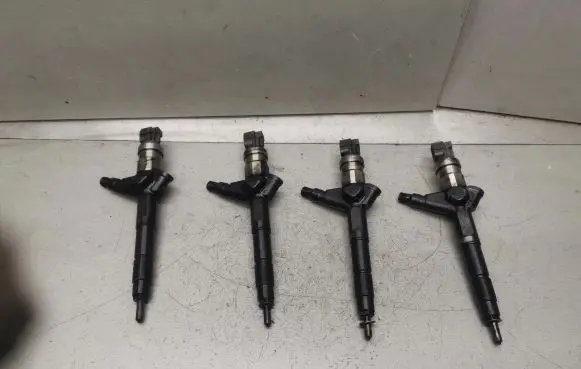 Nissan Primera Fuel injectors set 16600AU600