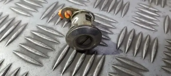 Hyundai Coupe Front door lock (next to the handle) 