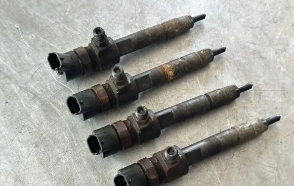 Fiat Doblo Fuel injectors set 0445110