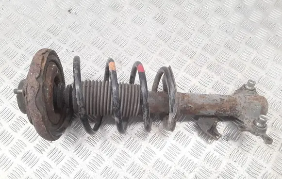 Nissan Primera Front shock absorber with coil spring