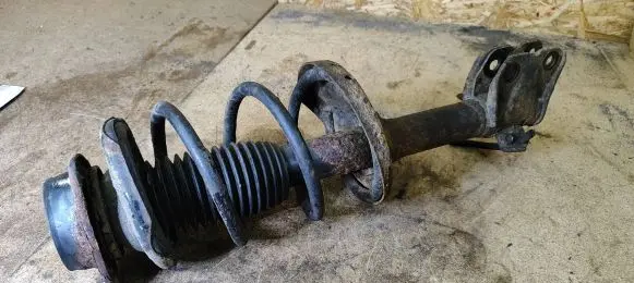 Subaru Outback Front shock absorber with coil spring