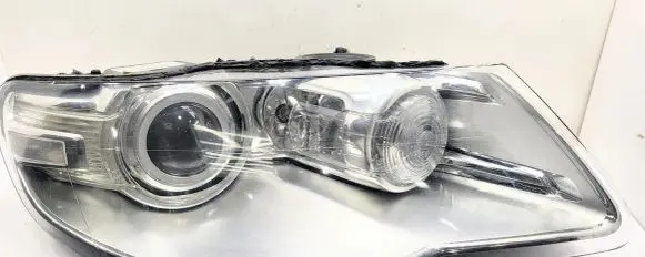 Volkswagen Touareg I Headlight/headlamp 7L6941032C