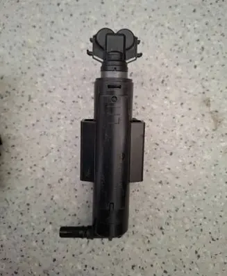 Ford Kuga II Headlight washer spray nozzle GV4113L015AE