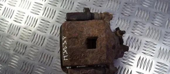 Mazda 323 F Front brake caliper