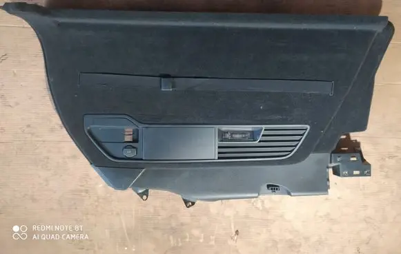 Trunk/boot side trim panel