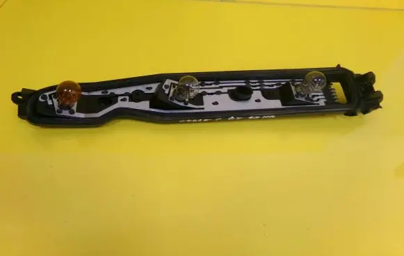 Opel Corsa C Tail light bulb cover holder