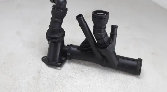 Thermostat/thermostat housing