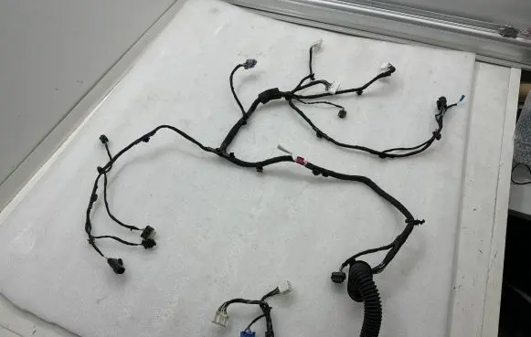 Tesla Model X Front door wiring loom 155257000C 323676320