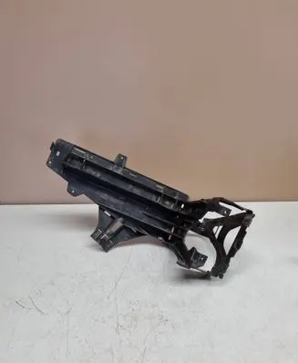 Headlight/headlamp mounting bracket