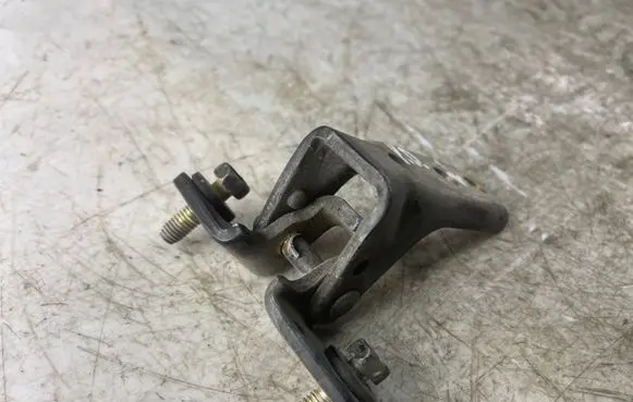 Front door lower hinge