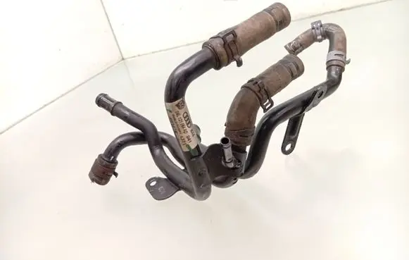 Volkswagen Golf VII Engine coolant pipe/hose 04L121064AD