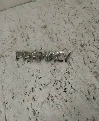 Mazda Premacy Manufacturers badge/model letters C10051