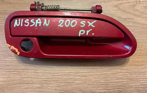 Nissan 200 SX Front door coupe exterior handle/bracket 