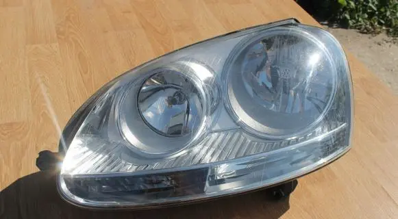 Volkswagen Golf V Headlight/headlamp 1LG24700719