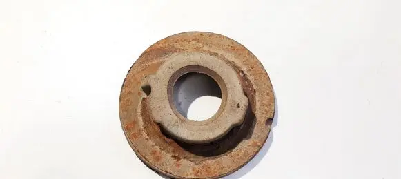 Volkswagen Touran I Front coil spring rubber mount 1k0512297c