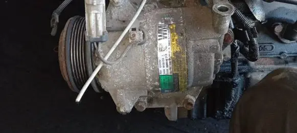 Opel Zafira B Air conditioning (A/C) compressor (pump) 13124752