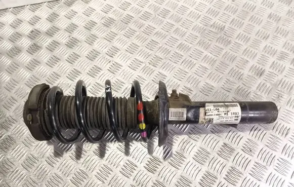 Volkswagen Touran II Front shock absorber with coil spring 1T0412015PR 1K0400053MR