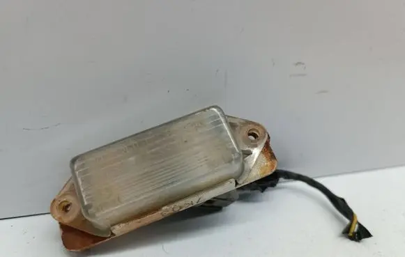 Mitsubishi Lancer VIII Number plate light 1141252