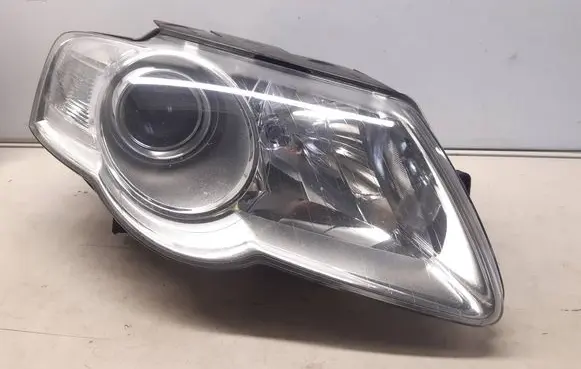 Volkswagen PASSAT B6 Headlight/headlamp 1LL24701404