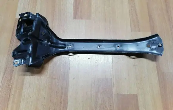 Radiator support slam panel bracket