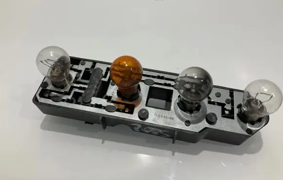 Mercedes-Benz C W202 Tail light bulb cover holder